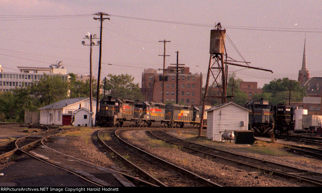 SBD 1239 leads a northbound pig train 